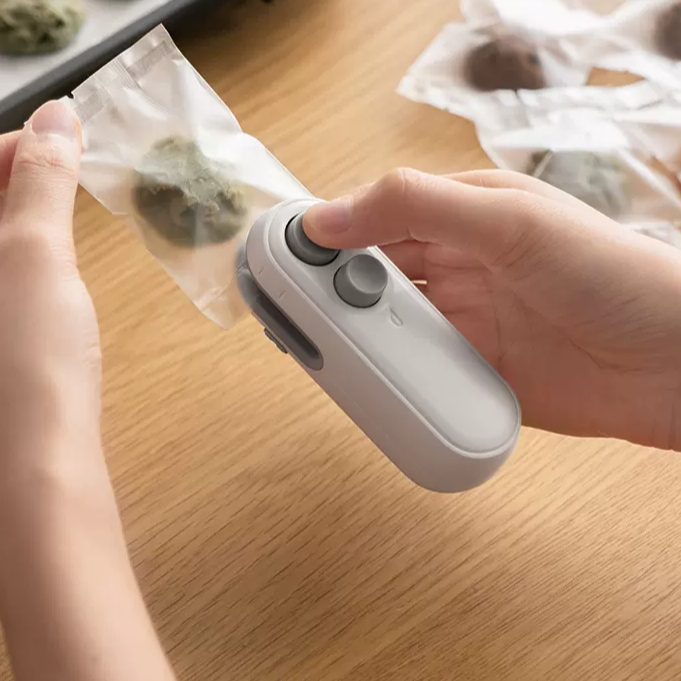 Dobshow® 2-in-1 Mini Heat Sealer -  Seal & Cutter